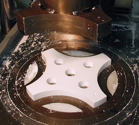 Compression Molding of a part blank.